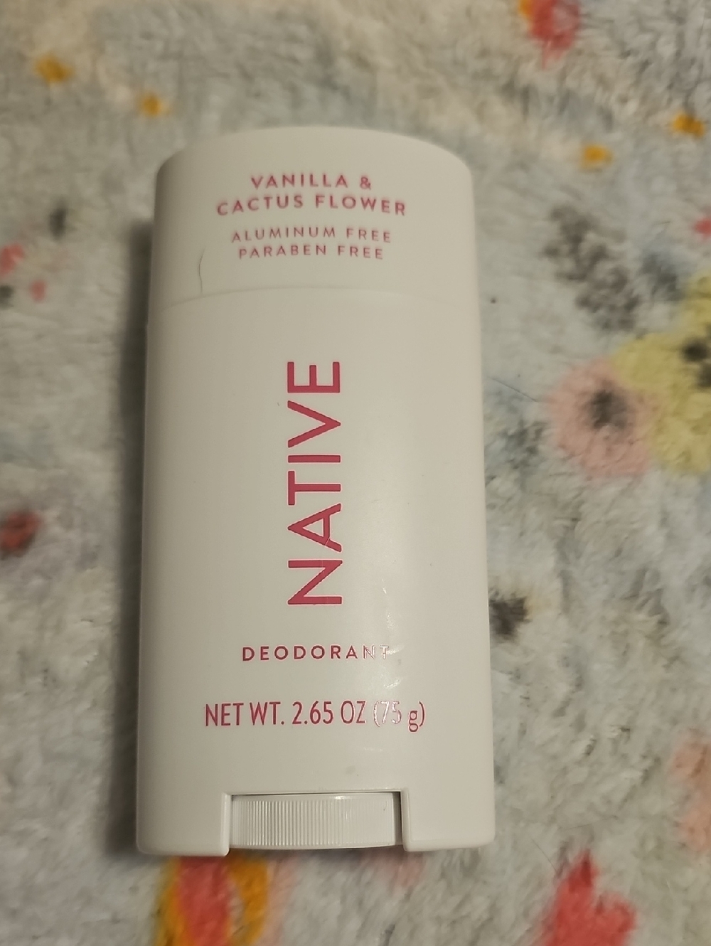 Native Deodorant Stick in White with Pink Branding